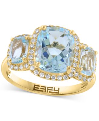 EFFY Collection - Sky Blue Topaz (4-1/4 ct. t.w.) & Diamond (1/4 ct. t.w.) Three Stone Halo Ring in 14k Gold
